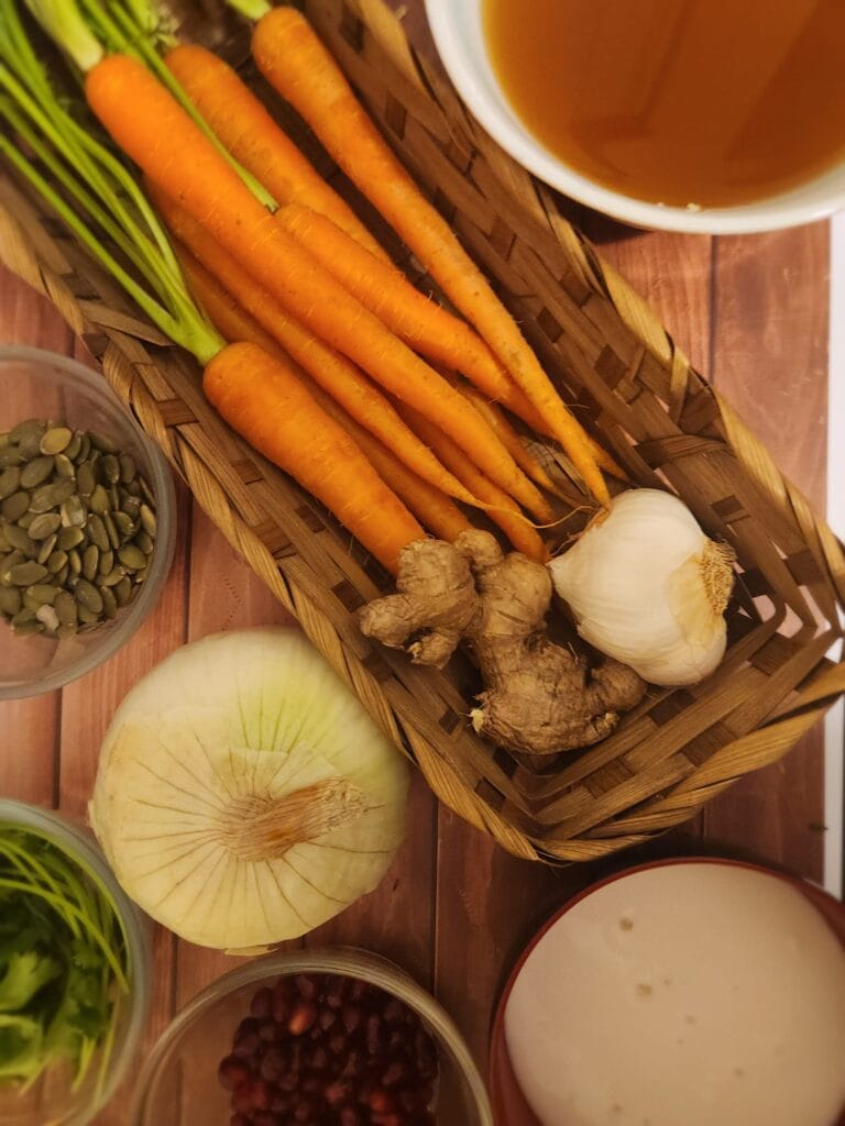 Creamy Coconut Carrot & Jasmine Rice Soup Top down view of soup